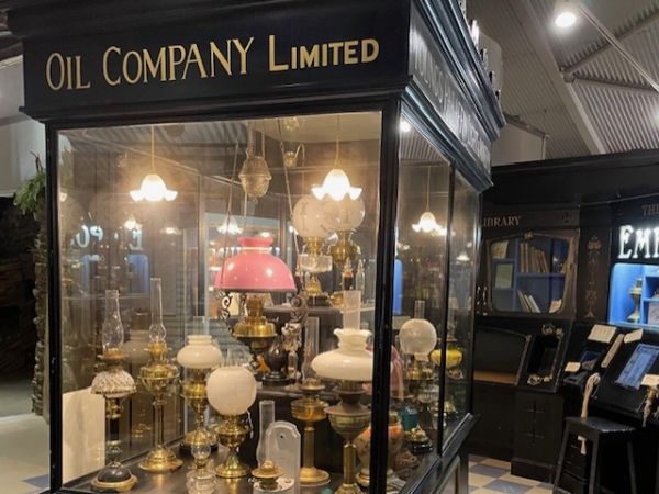 View of museum case of oil lamps